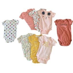 Lot of 9 Onesies NWOT.